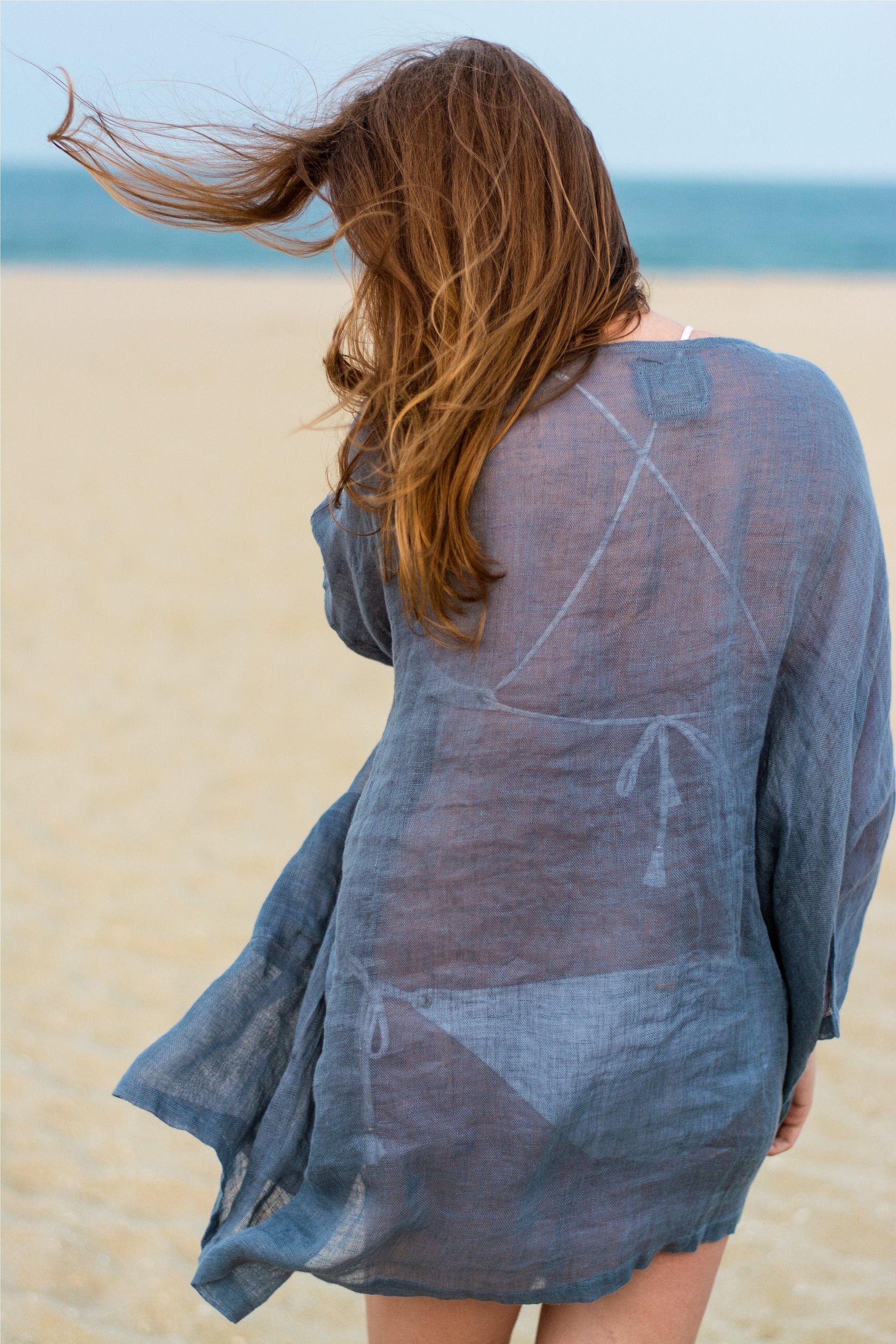 Close-up: The sheer texture of a 100% European washed linen tunic.