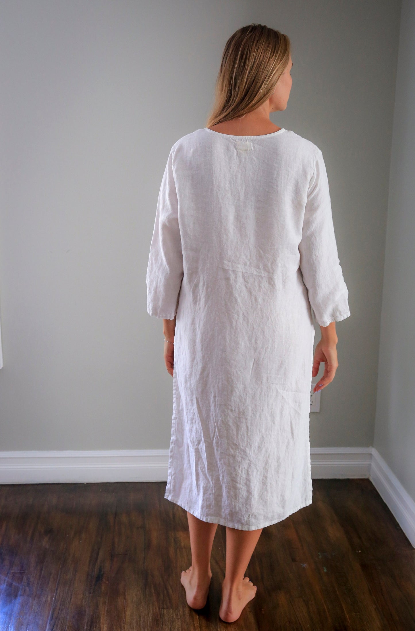 Back view of medium-weight linen caftan, soft and draping beautifully.