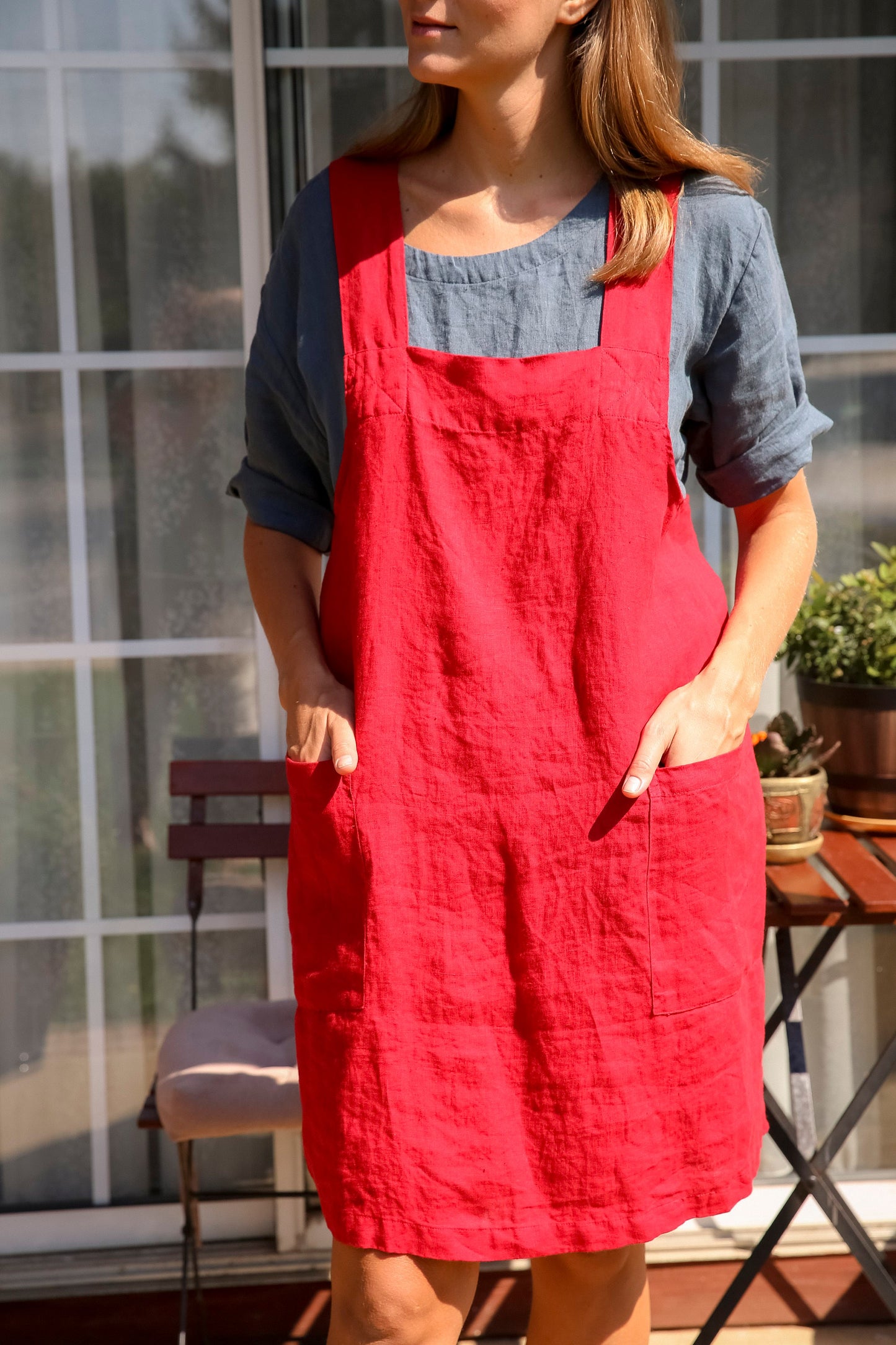 Festive red apron made from 100% European flax, perfect for holiday cooking