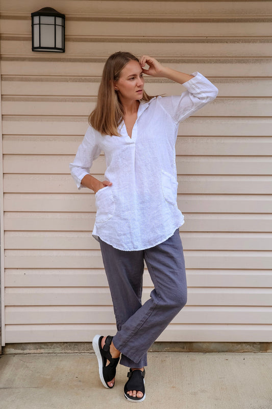 Model gracefully wearing the Linen October Tunic, showcasing its fit.