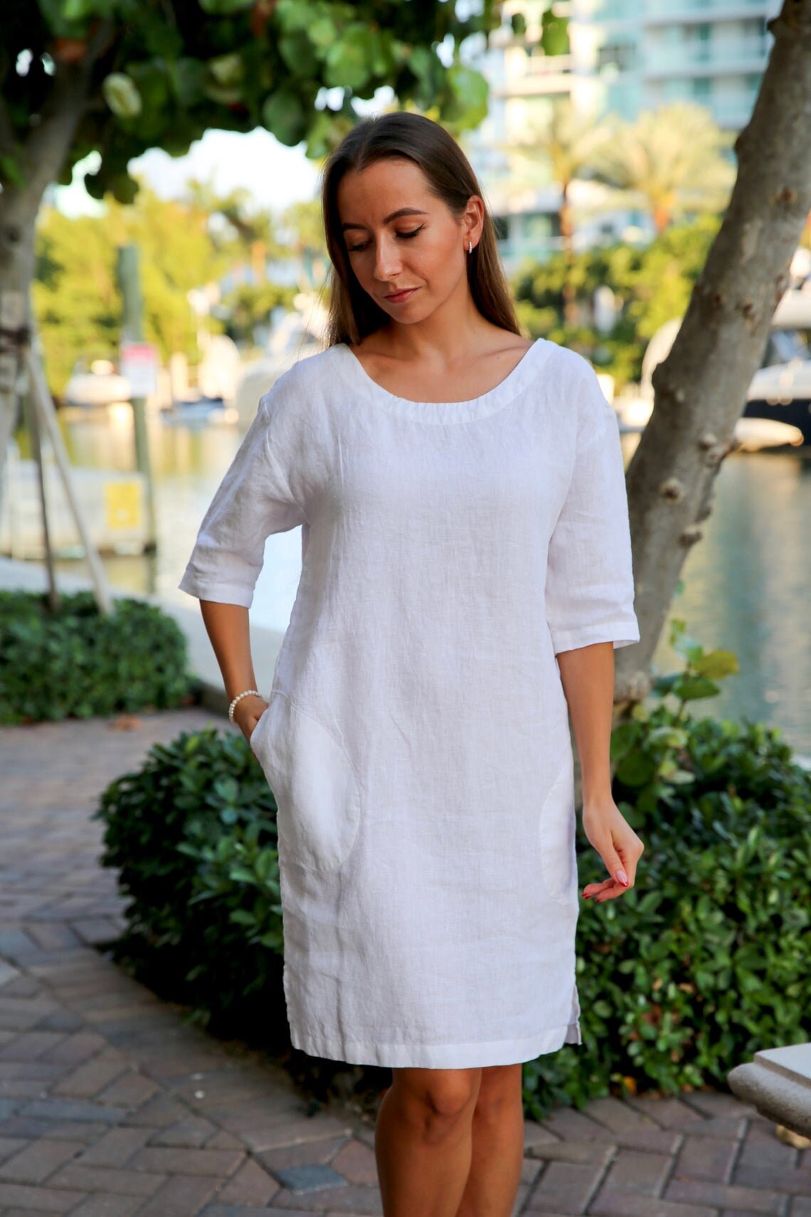 Linen dress with 3/4 sleeves and pockets, encapsulating the essence of boho elegance.