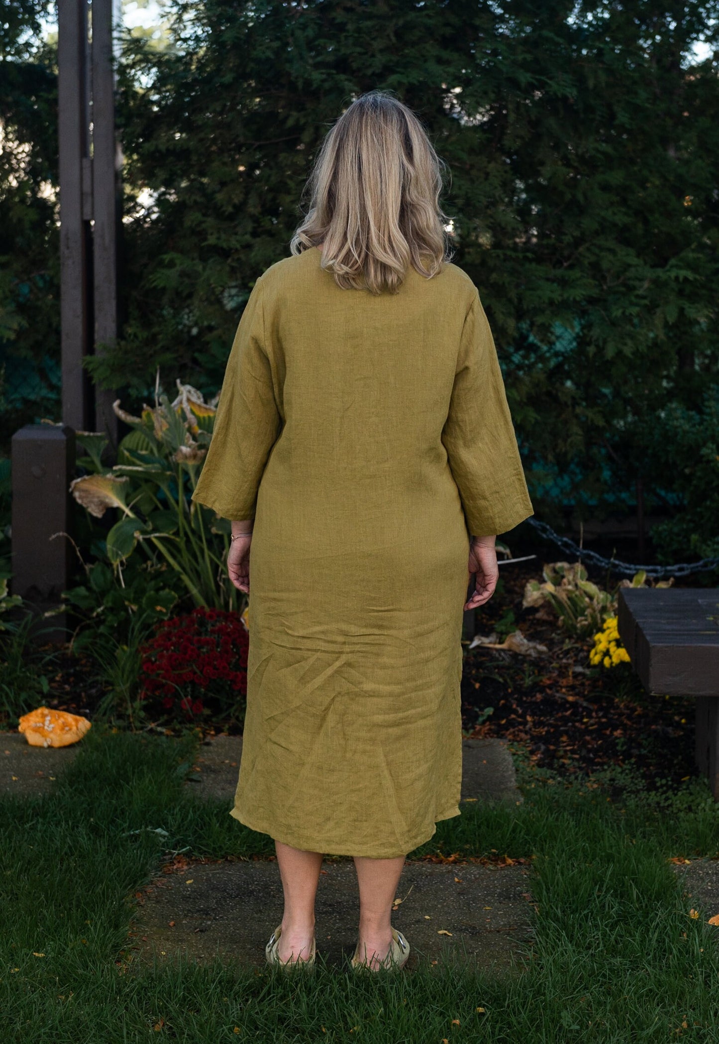 Mustard yellow linen caftan dress offering both style and lounge-worthy comfort.