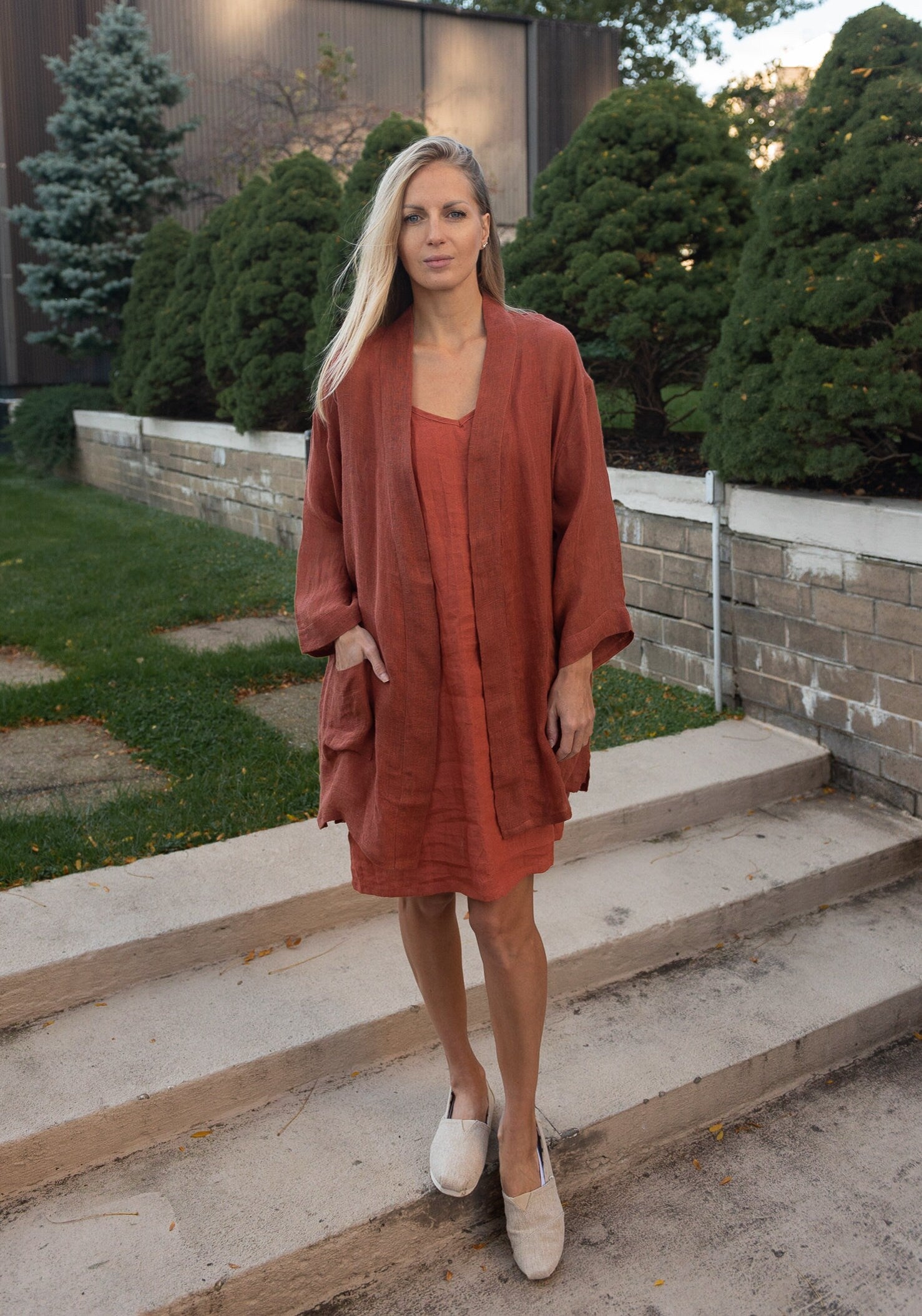 Stylish woman embracing cottagecore vibes in an oversized linen cardigan
