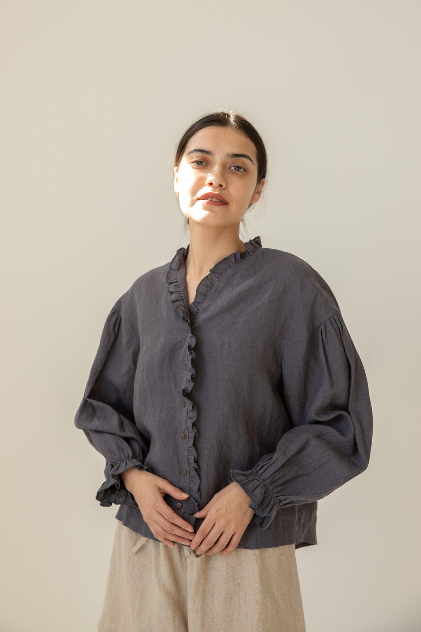 Tailored Linen Blouse perfect for both casual and formal occasions.