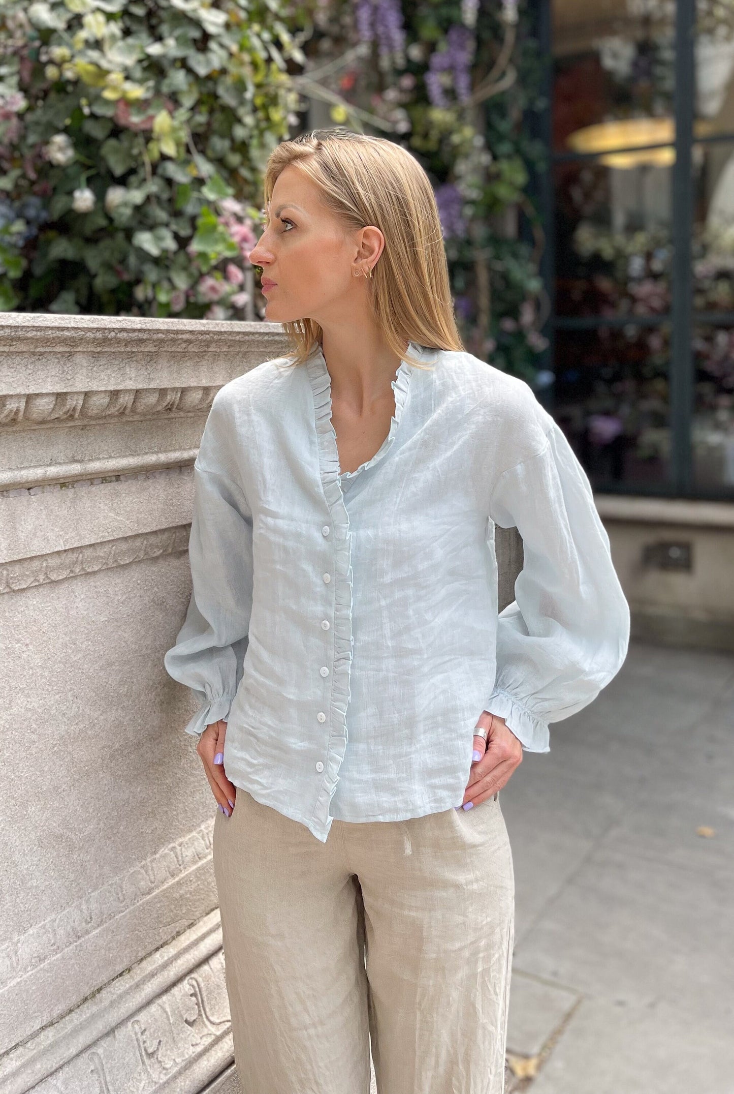 Linen Blouse emphasizing its soft, breathable texture for warmer days.