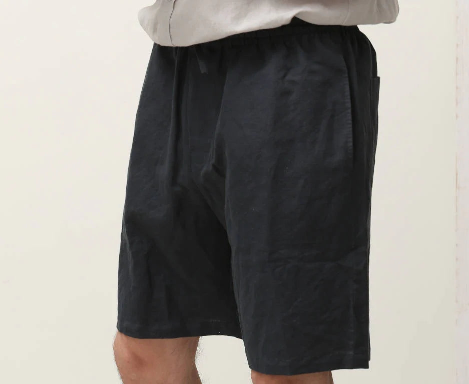 Man ready for a beach outing, styled in Handmade Linen Men's Shorts.