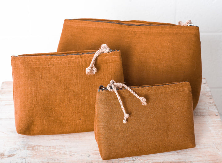 Versatile linen pouches: Cosmetic storage meets chic fashion.