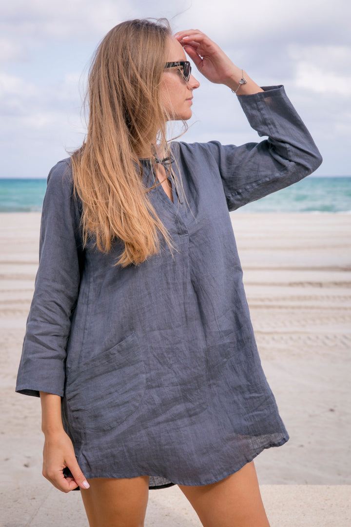 Linen tunic shirt: Summer elegance meets beach-ready fashion.