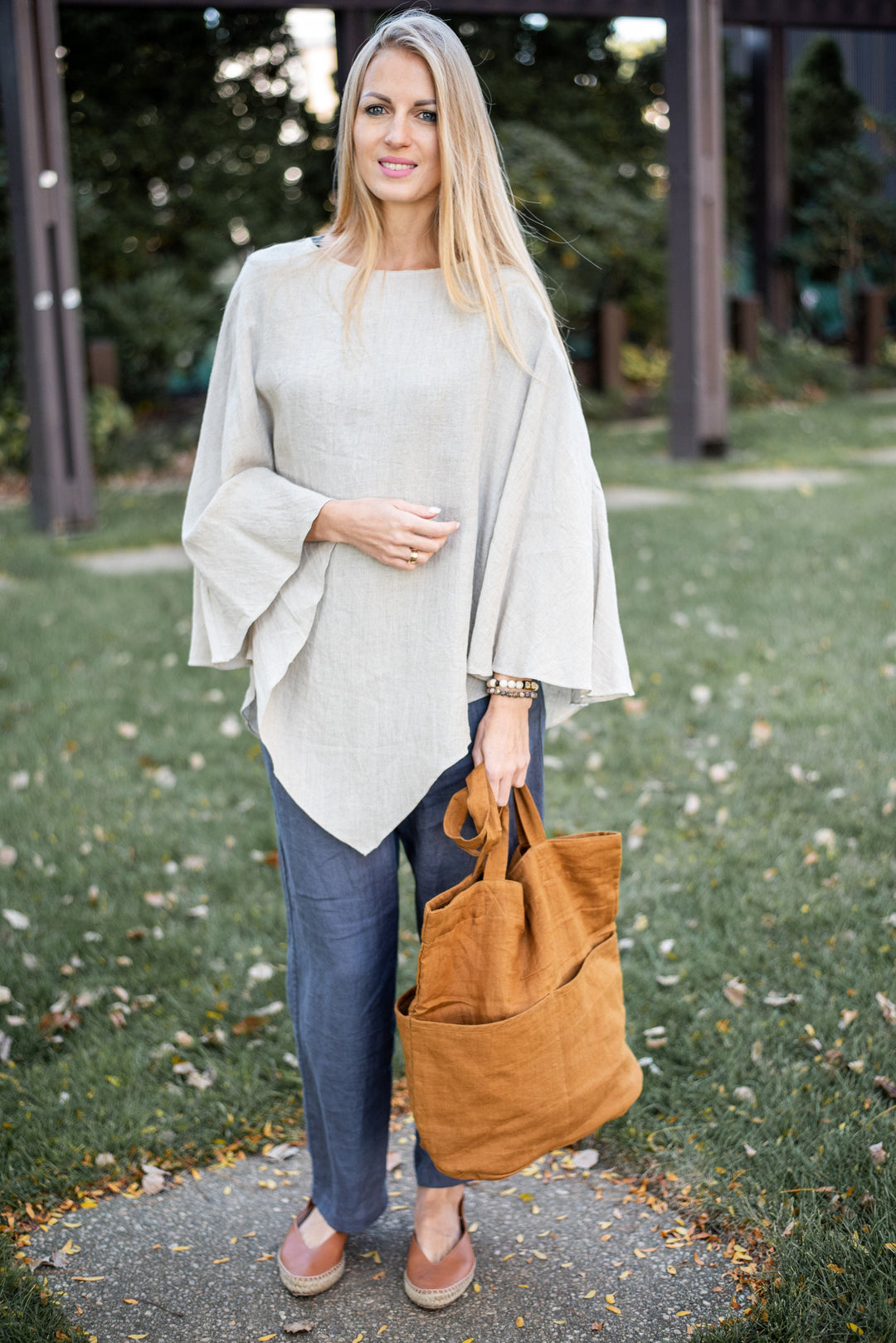 Detailed view of the poncho's edge, showcasing the quality of European flax.