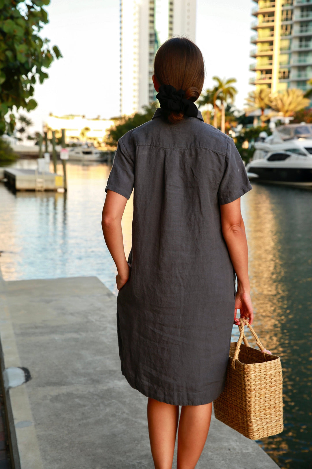 Close-up: Texture and natural feel of the medium-length linen dress.