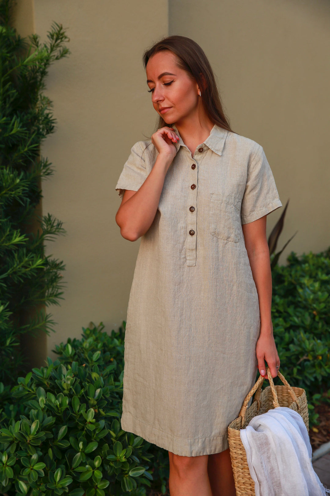 Linen Dress with chest folds and a straight fit, epitomizing understated elegance.