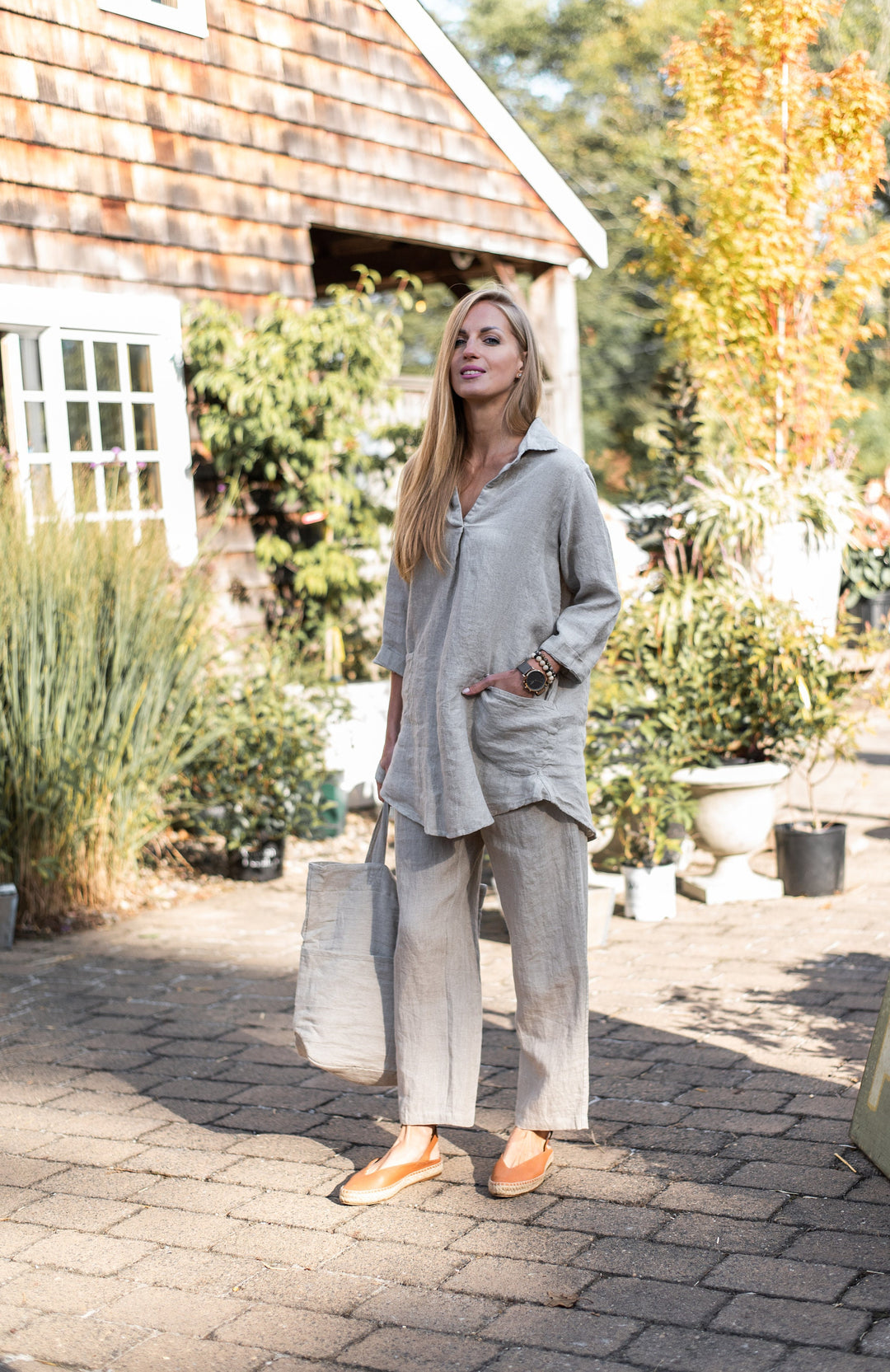 A side view of the Linen October Tunic, displaying its length and style.