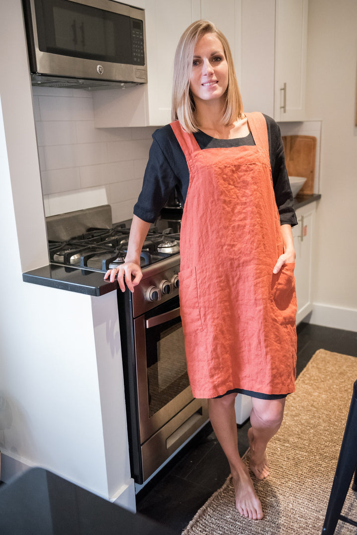 Young woman and  wearing linen apron