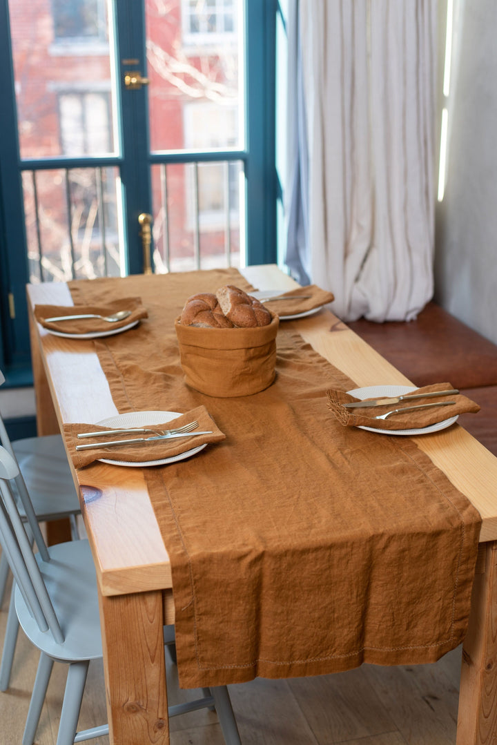 Hemstitch detailing on sustainable linen table runner.