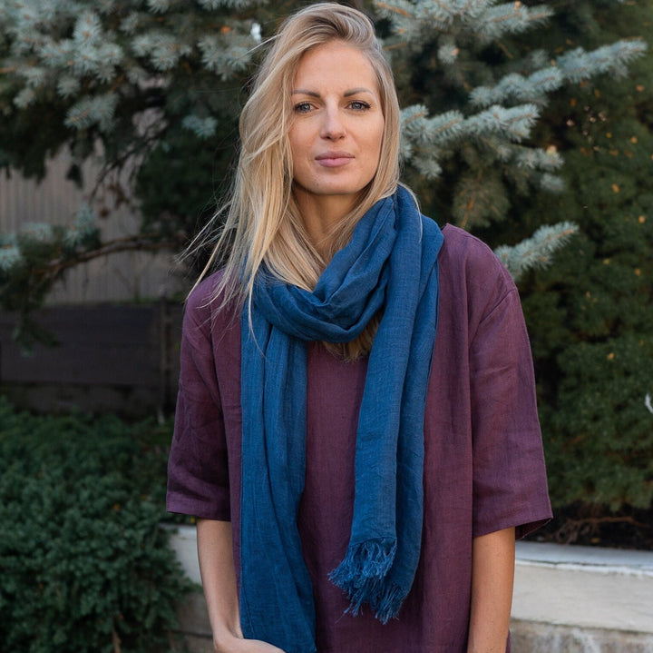 Woman with the scarf tied as a beach cover-up.