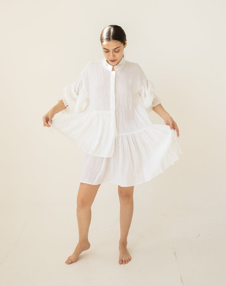 Linen Tunic with asymmetric cut, perfect for free-spirited fashion lovers.