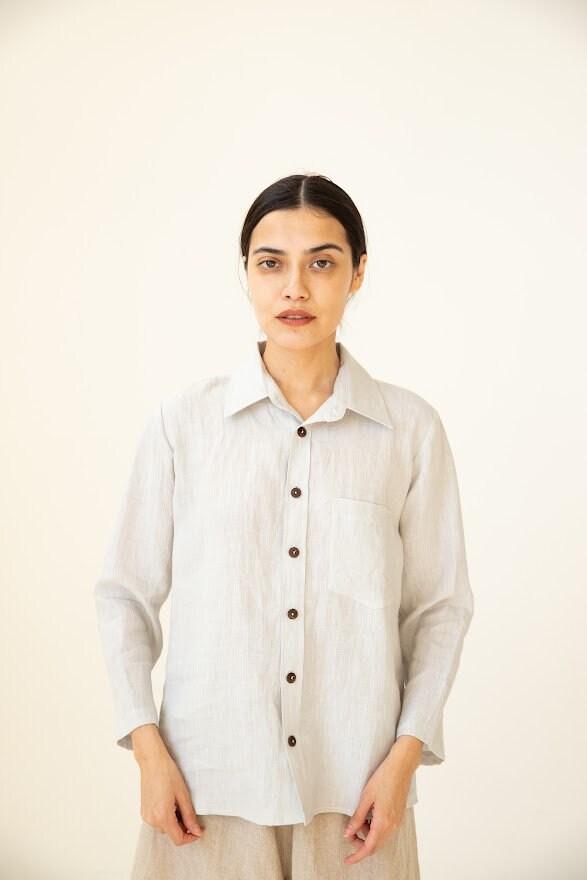 Casual elegance defined: woman in a breathable Linen Basic Shirt.