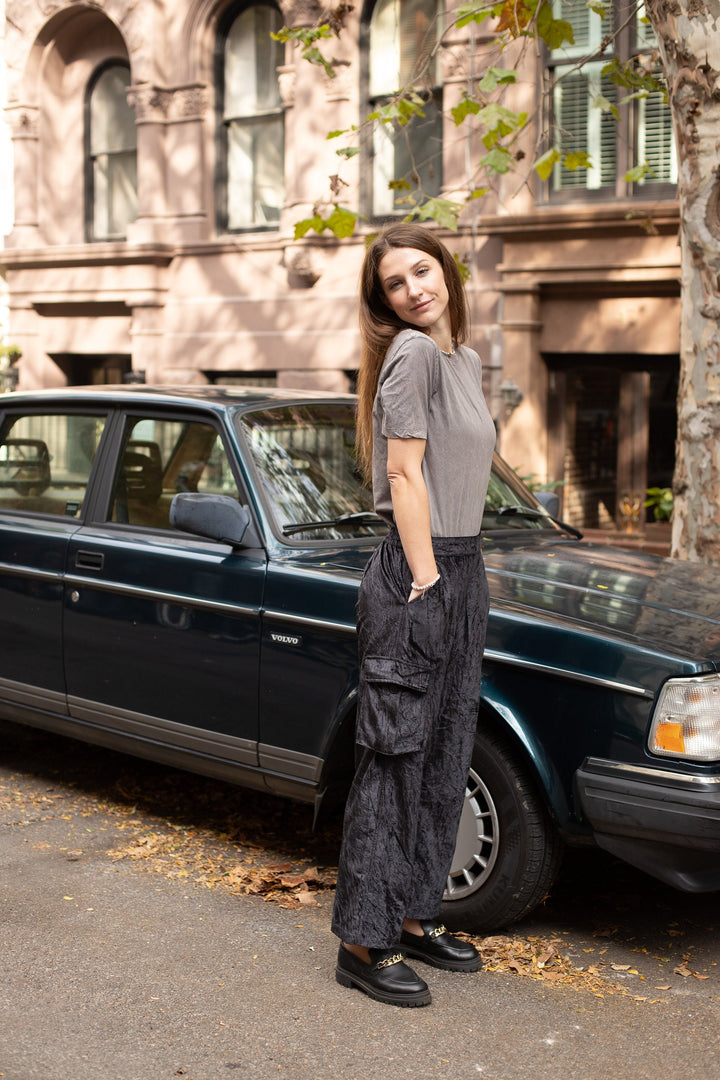 Stylish woman showcasing Velvet Cargo Pants for a luxurious and comfortable fashion statement.